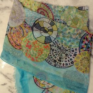 Steve Madden lightweight blanket scarf in colorful circle pattern. Approx 40x74